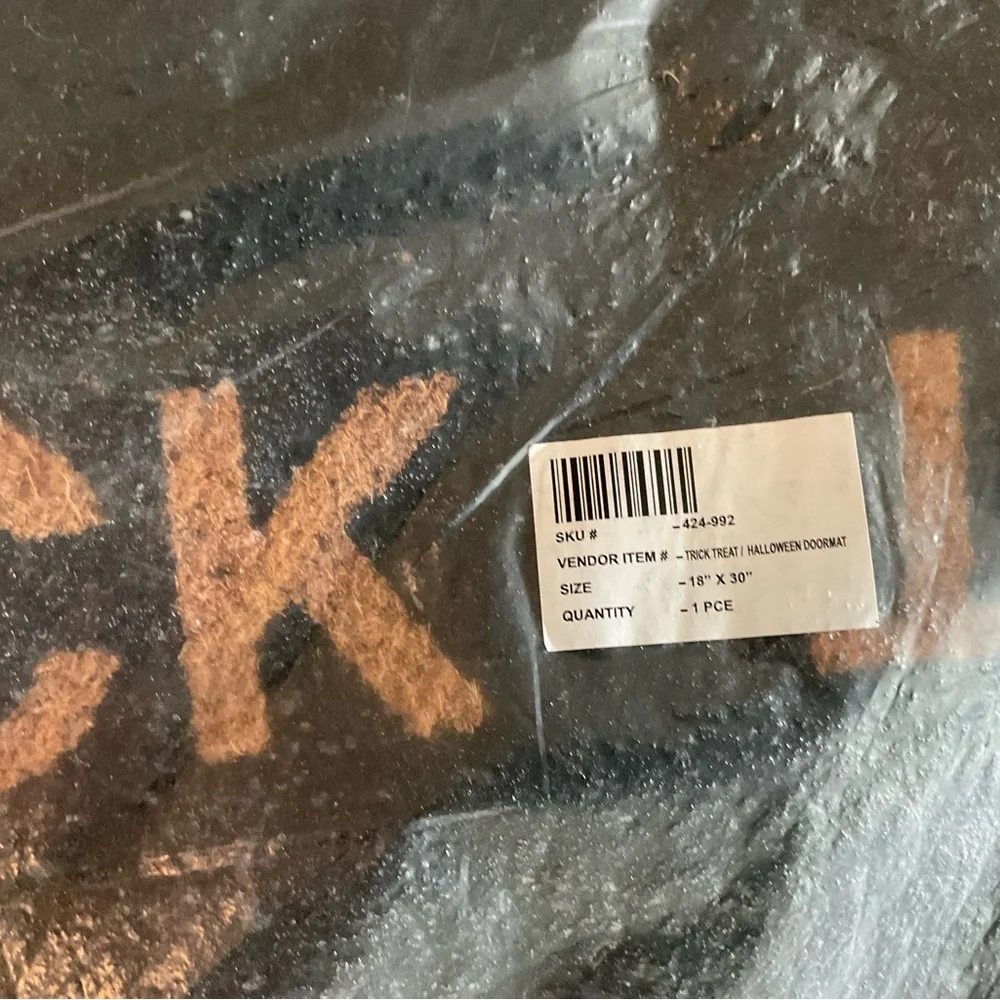 New Halloween trick or treat door mat